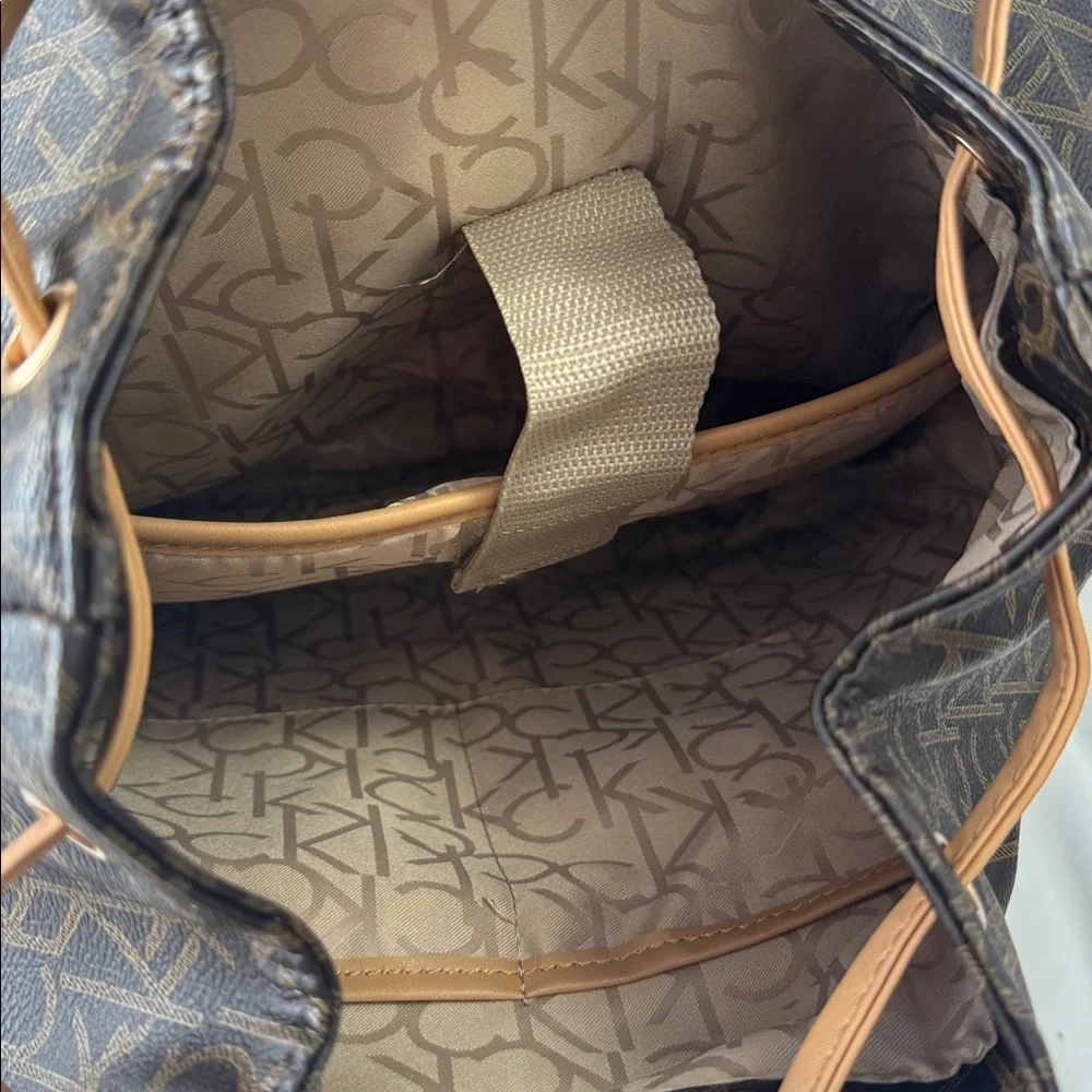 Calvin Klein Hudson Monogram Backpack in brown EUC